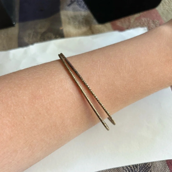 3/$20 2 Piece Set Gold Tone Imprinted Shimmer Thin Large Bangle Bracelets - Picture 3 of 4